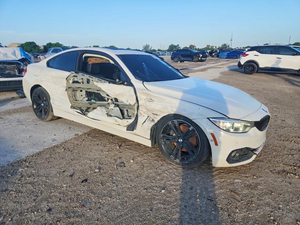 2014 BMW 4er VIN WBA3N7C59EF719666 COPART salvage auction — SIDE, Fl - Certificate Of Title, sold $1,000 on 2026-07-02 (photo 4)