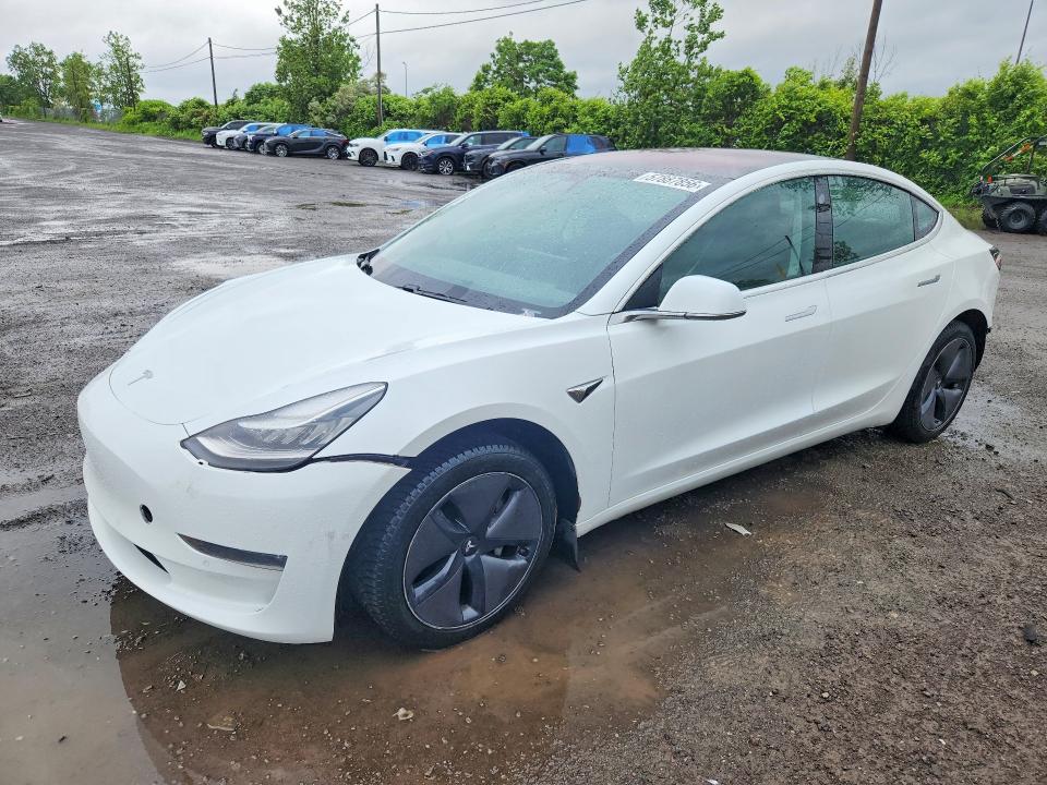 2018 Tesla Model 3 VIN 5YJ3E1EA7JF104008 COPART salvage auction — SIDE, Qc - Gravement Accidente, sold $5,300 on 2026-07-21 (photo 1)