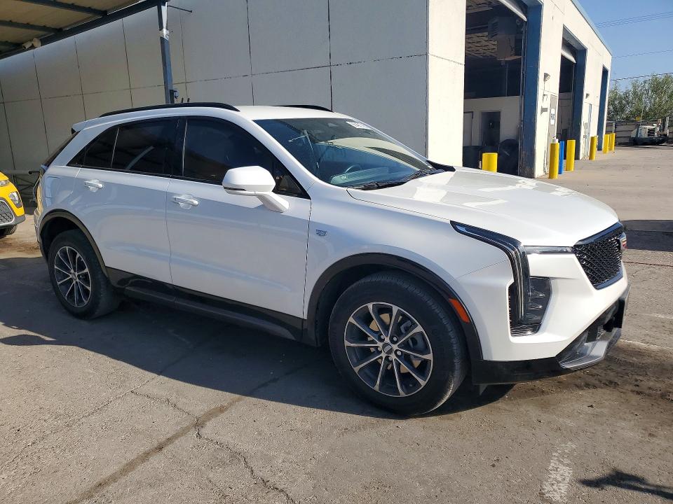 2024 Cadillac Xt4 VIN 1GYFZFR40RF159100 COPART salvage auction — SIDE, Tx - Salvage Vehicle Title, sold $15,300 on 2026-07-31 (photo 4)