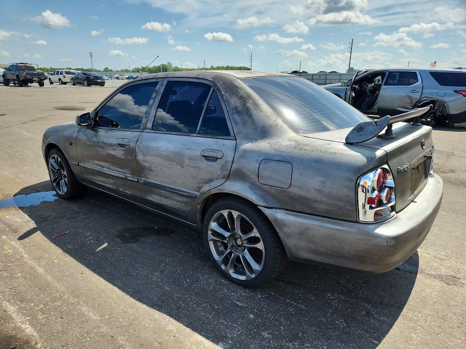 2002 Mazda Protege VIN JM1BJ225X21599996 COPART salvage auction — SIDE, FL - CERT OF TITLE SLVG REBUILDABLE, sold $250 on 2026-07-22 (photo 2)