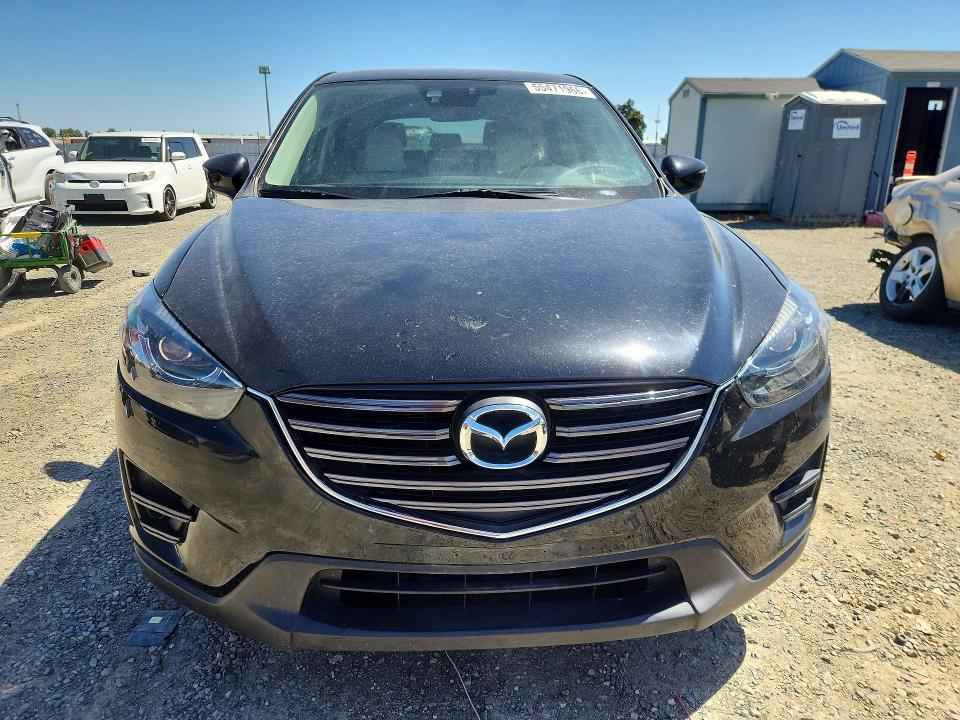 2016 Mazda Cx-5 VIN JM3KE4DY0G0635304 COPART salvage auction — SIDE, CA - SALVAGE CERTIFICATE, sold $15 on 2026-07-21 (photo 5)