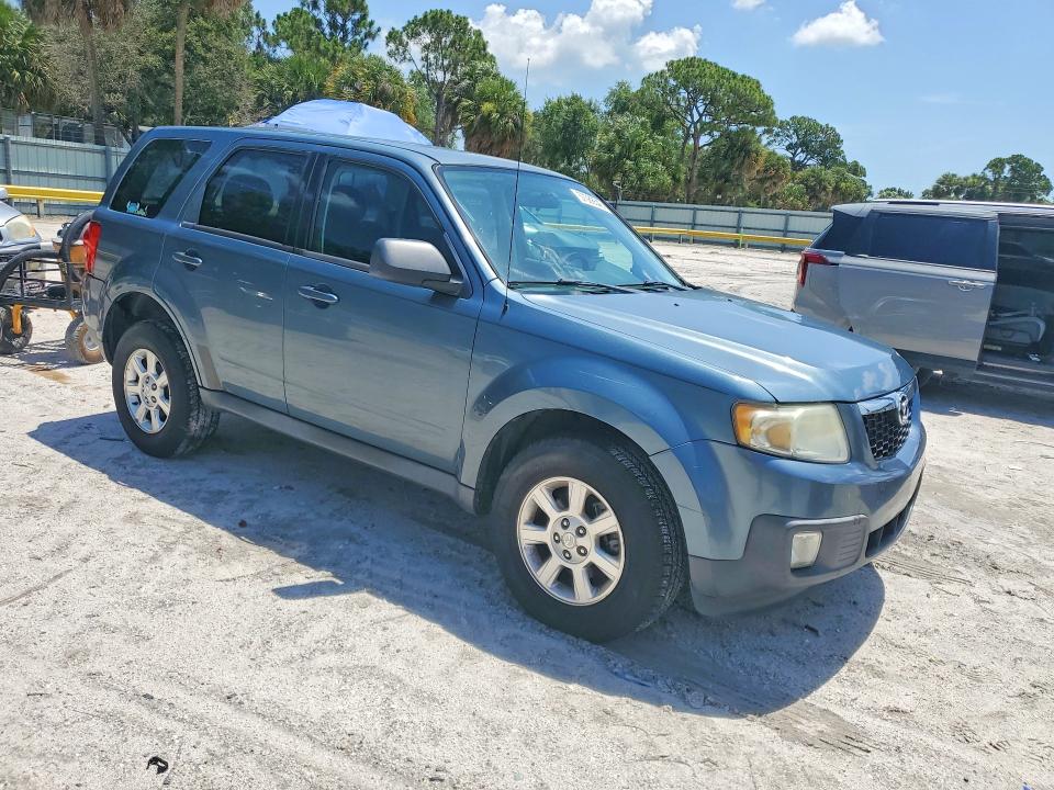 2011 Mazda Tribute VIN 4F2CY0C78BKM07294 COPART salvage auction — NORMAL WEAR, Fl - Certificate Of Title, sold $850 on 2026-07-08 (photo 4)