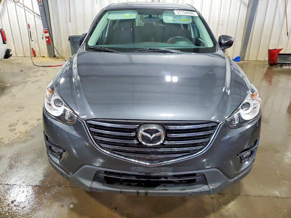 2016 Mazda VIN JM3KE4CY5G0632187 COPART salvage auction — SIDE, Mn - Cert Of Title-Salvage, sold $350 on 2026-07-21 (photo 5)