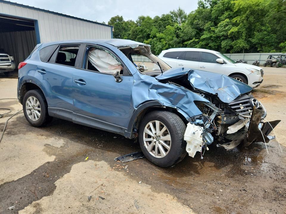 2016 Mazda Cx-5 VIN JM3KE2CY3G0874349 COPART salvage auction — ROLLOVER, LA - CERT OF TITLE-SALVAGE, sold $700 on 2026-07-02 (photo 4)