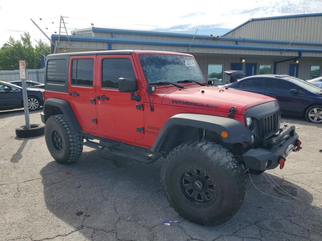 2015 Jeep Wrangler Unlimited VIN 1C4BJWDG3FL677289 COPART salvage auction — Front End, TN - SALVAGE CERTIFICATE, sold $5,000 on 2026-07-09 (photo 4)