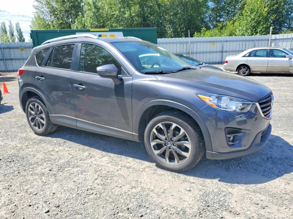 2016 Mazda Cx-5 VIN JM3KE4DY6G0900033 COPART salvage auction — MINOR DENT/SCRATCHES, Wa - Vehicle Cert Of Ownership-Titl, sold $2,200 on 2026-07-09 (photo 4)