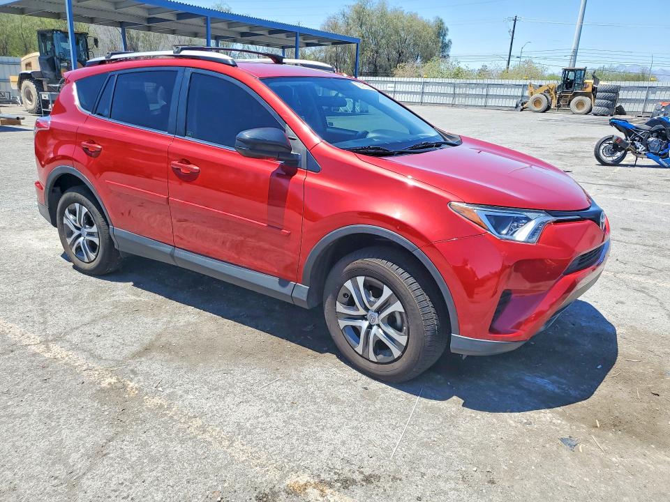 2016 Toyota Rav 4 VIN JTMZFREV4GJ081099 COPART salvage auction — SIDE, NV - SALVAGE TITLE, sold $6,300 on 2026-07-27 (photo 4)