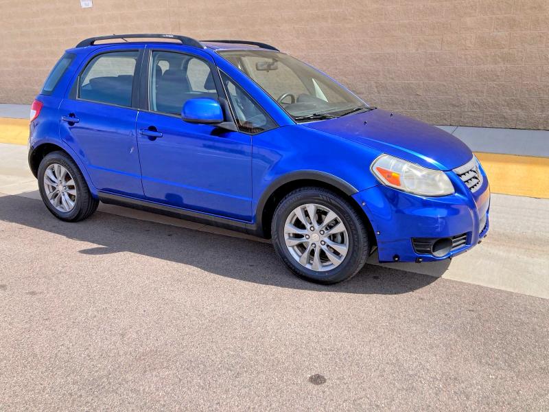 2013 Suzuki Sx4 VIN JS2YB5A31D6101902 COPART salvage auction — DAMAGE HISTORY, Co - Dlr/Dis/Exp-Ct Others-Ca Acq (P), sold $450 on 2026-07-09 (photo 1)