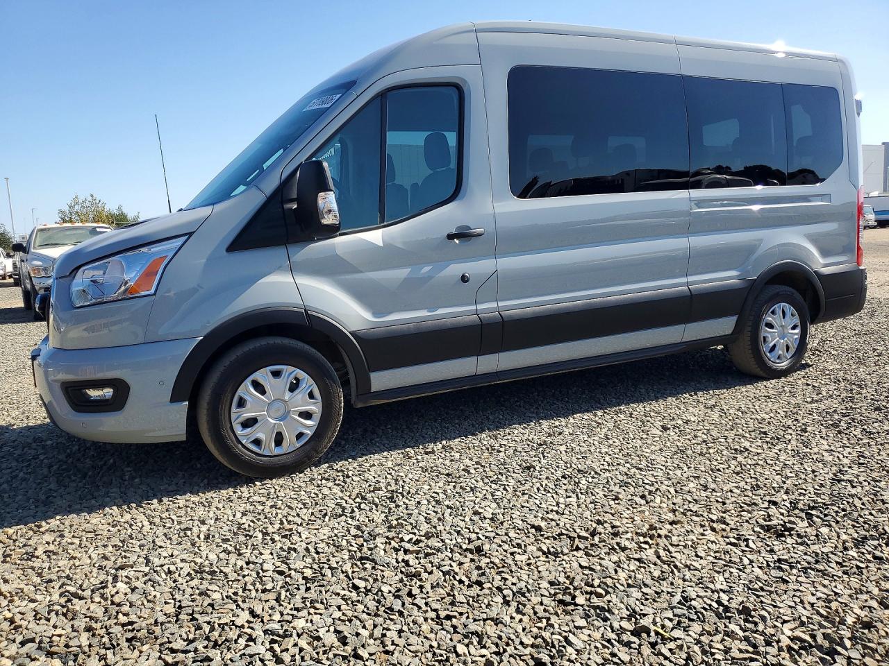 2022 Ford Transit VIN 1FBAX2CG9NKA69094 COPART salvage auction — Minor Dent/Scratches, CA - DIS/DLR/EXP ONLY CLEAN TITLE (P), sold $30,250 on 2026-06-29 (photo 1)