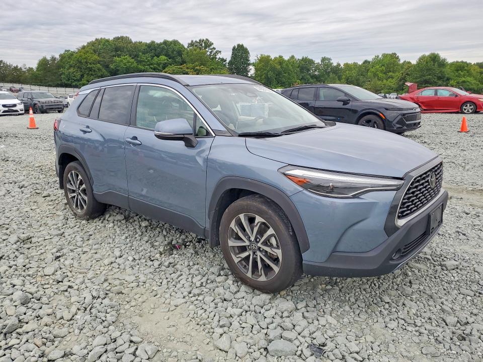 2023 Toyota Corolla cross VIN 7MUDAABGXPV050660 COPART salvage auction — SIDE, NC - SALVAGE CERTIFICATE OF TITLE, sold $10,200 on 2026-07-29 (photo 4)