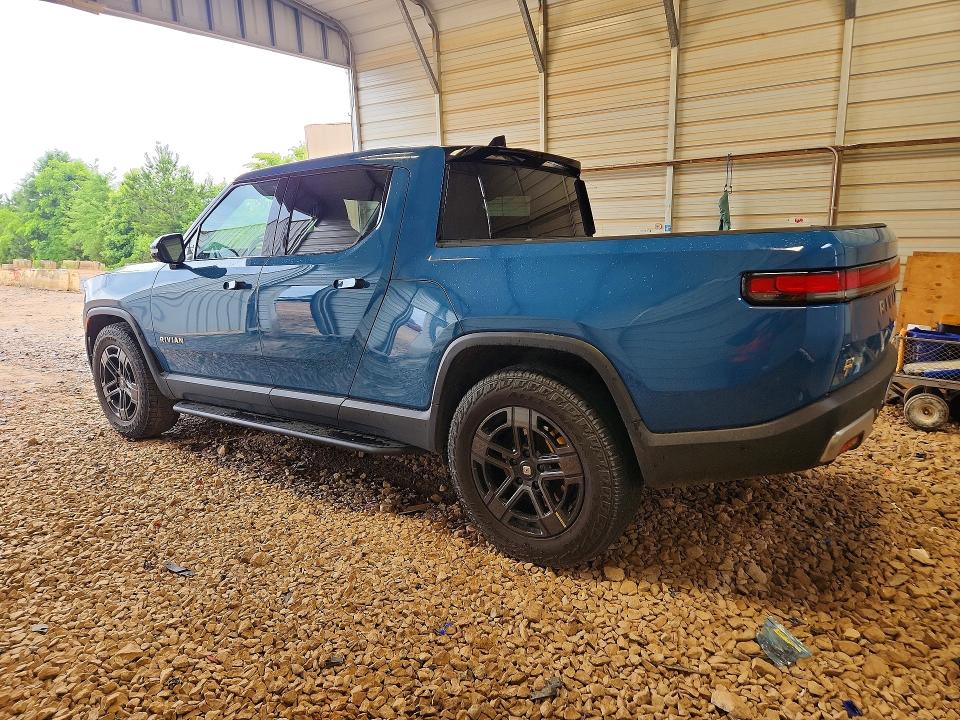 2023 Rivian VIN 7FCTGAAAXPN026117 COPART salvage auction — SIDE, Nc - Salvage Certificate Of Title, sold $8,000 on 2026-07-27 (photo 2)