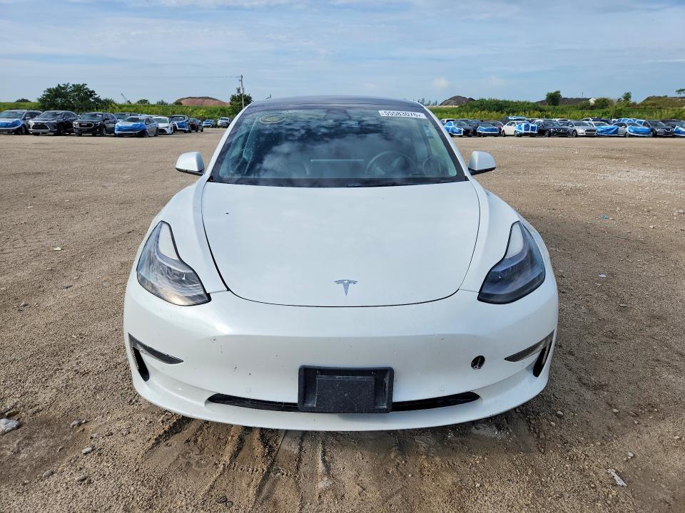 2022 Tesla Model 3 VIN 5YJ3E1EB0NF110781 COPART salvage auction — FRONT END, Fl - Cert Of Title Slvg Rebuildable, sold $9,000 on 2026-07-09 (photo 5)