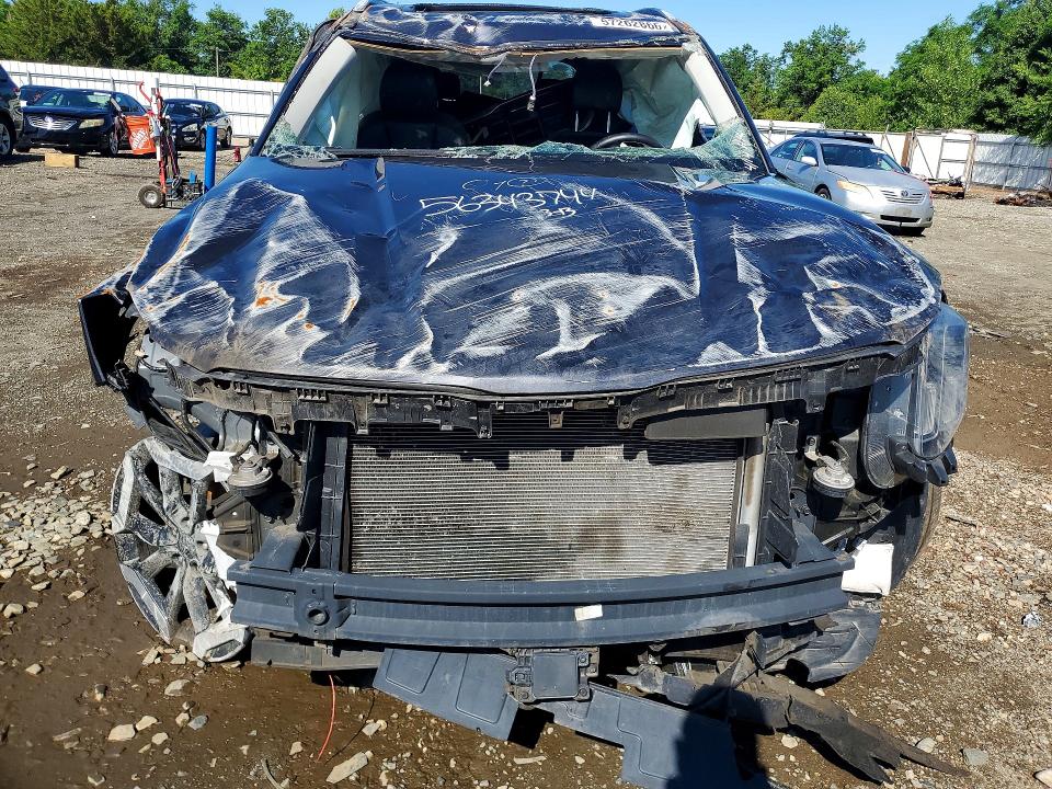2025 Kia Telluride VIN 5XYP6DGC0SG594218 COPART salvage auction — ROLLOVER, Co - Non-Repairable Cert Of Title, sold $7,300 on 2026-07-29 (photo 5)