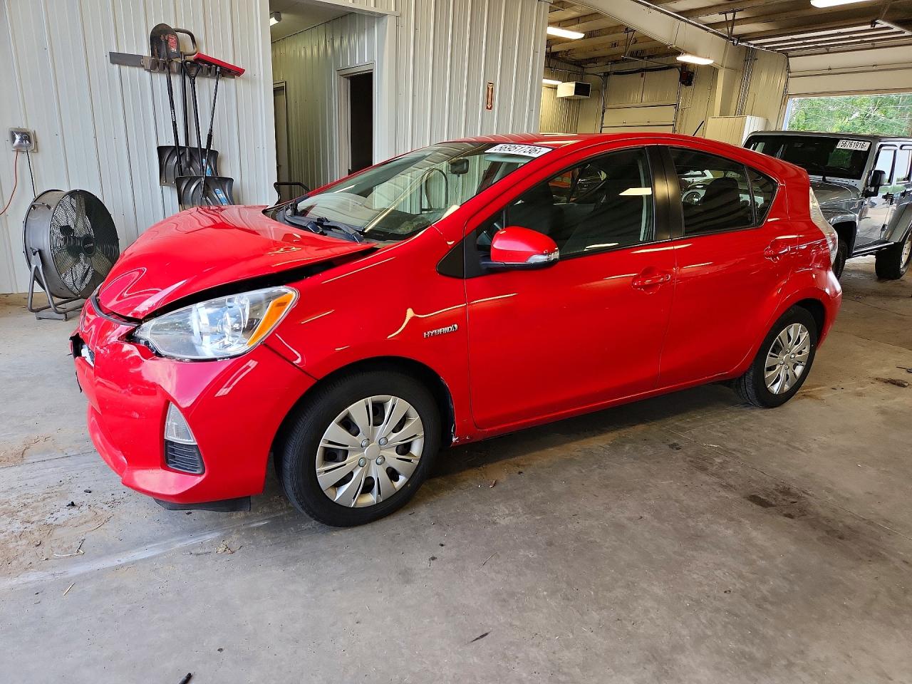 2014 Toyota Prius C VIN JTDKDTB33E1560327 COPART salvage auction — Front End, MN - CERT OF TITLE-PRIOR SALVAGE, sold $1,200 on 2026-07-09 (photo 1)