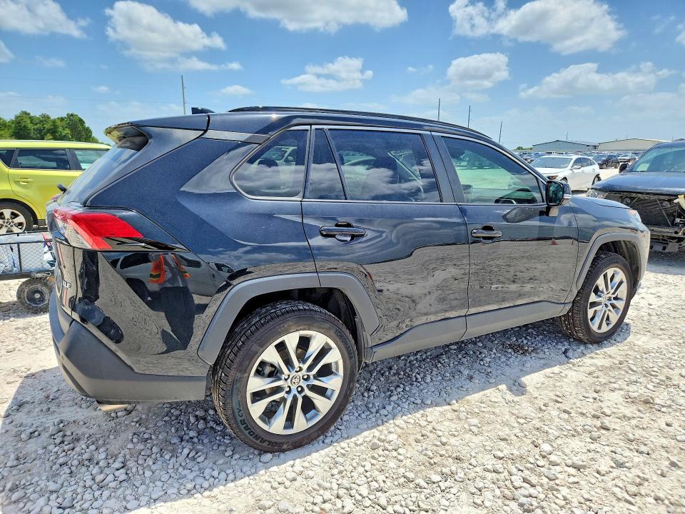 2021 Toyota VIN 2T3C1RFV6MC129025 COPART salvage auction — SIDE, Tx - Salvage Vehicle Title, sold $13,100 on 2026-07-09 (photo 3)
