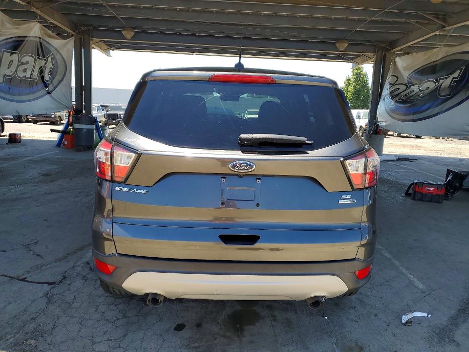 2017 Ford Escape VIN 1FMCU9GD6HUE39346 COPART salvage auction — MINOR DENT/SCRATCHES, Ca - Dis/Dlr/Exp Only Clean Title, sold $450 on 2026-07-02 (photo 6)