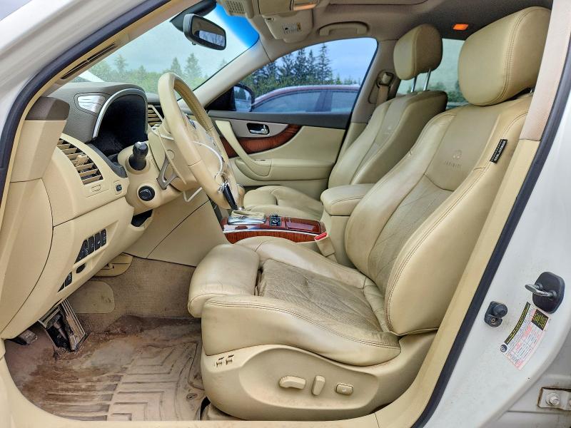 2012 Infiniti VIN JN8BS1MW9CM180295 COPART salvage auction — MINOR DENT/SCRATCHES, On - Permit No Brand - Unfit, sold $200 on 2026-07-29 (photo 7)