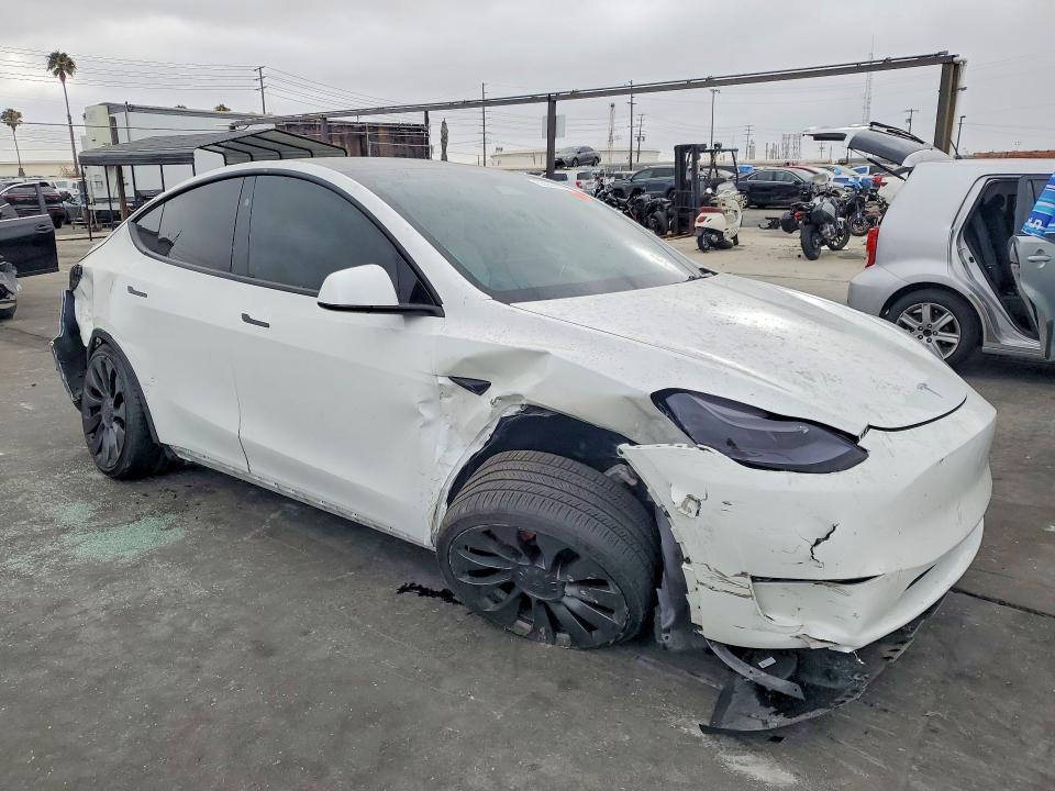 2023 Tesla Model y VIN 7SAYGDEFXPF917545 COPART salvage auction — FRONT END, Ca - Salvage Certificate, sold $10,500 on 2026-07-02 (photo 4)
