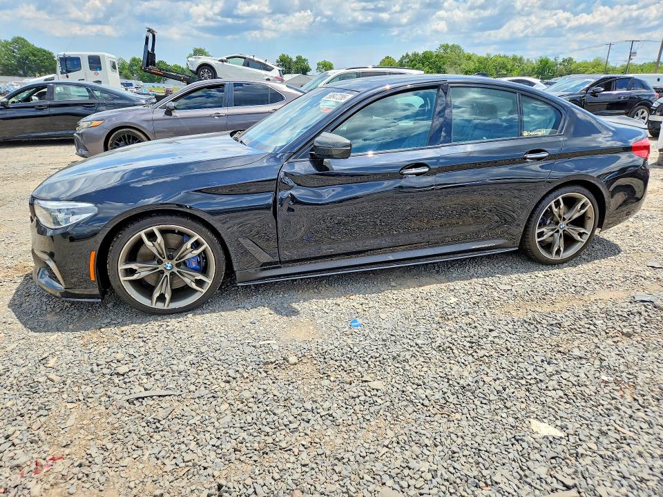 2018 BMW M550i xdrive VIN WBAJB9C58JB035348 COPART salvage auction — SIDE, RI - CERTIFICATE OF TITLE, sold $11,500 on 2026-07-16 (photo 1)