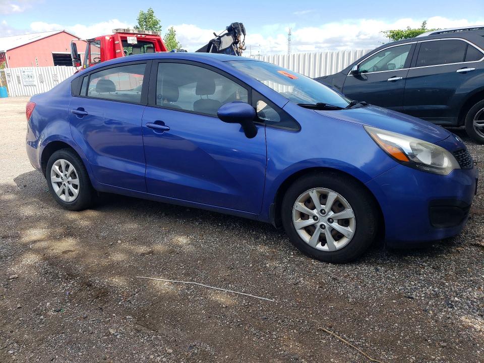 2014 Kia Rio VIN KNADM4A31E6368615 COPART salvage auction — SIDE, On - Permit Irrepairable, sold $425 on 2026-07-09 (photo 4)