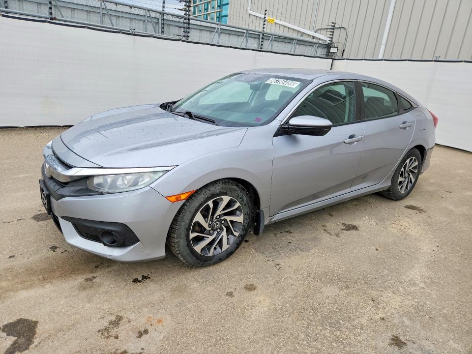 2018 Honda Civic VIN 2HGFC2F61JH017171 COPART salvage auction — MINOR DENT/SCRATCHES, Ab - Bos - Active, sold $6,900 on 2026-07-03 (photo 1)