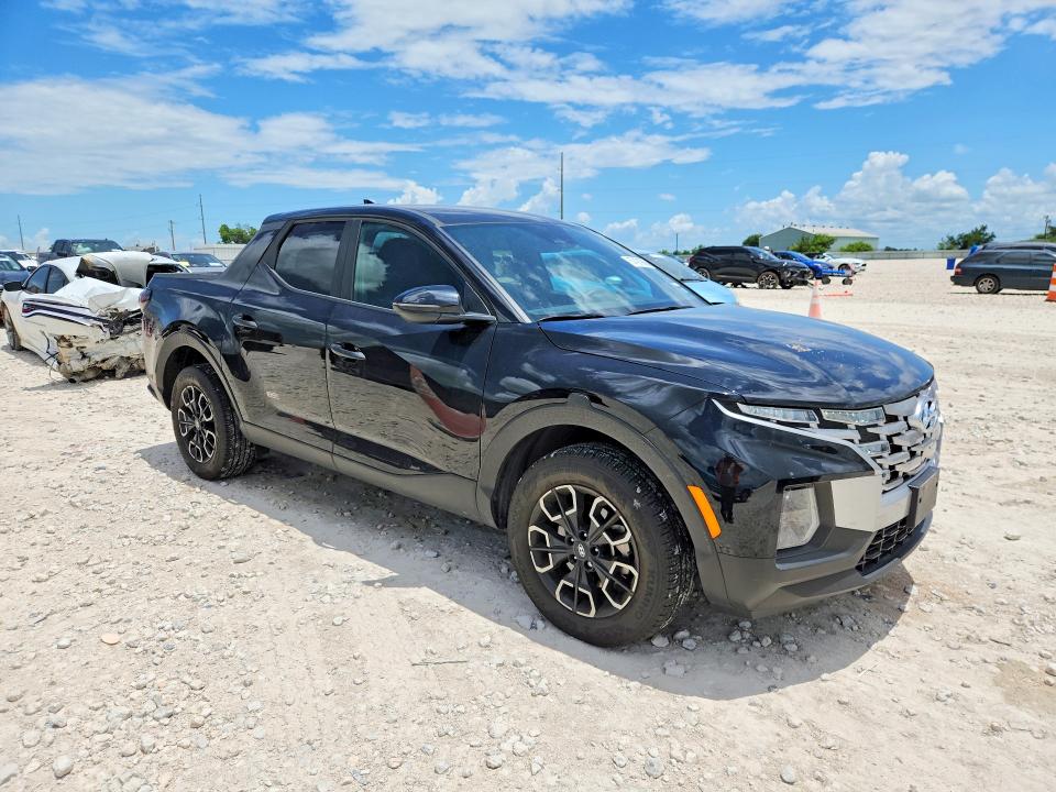 2024 Hyundai Santa cruz VIN 5NTJB4DE3RH112532 COPART salvage auction — SIDE, Tx - Salvage Vehicle Title, sold $6,500 on 2026-07-16 (photo 4)