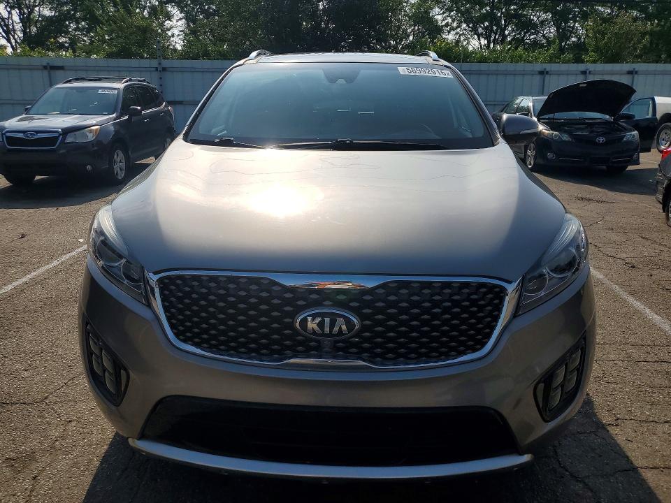 2016 Kia Sorento VIN 5XYPKDA59GG142538 COPART salvage auction — SIDE, OH - CERT OF TITLE-SALVAGE, sold $2,950 on 2026-07-31 (photo 5)
