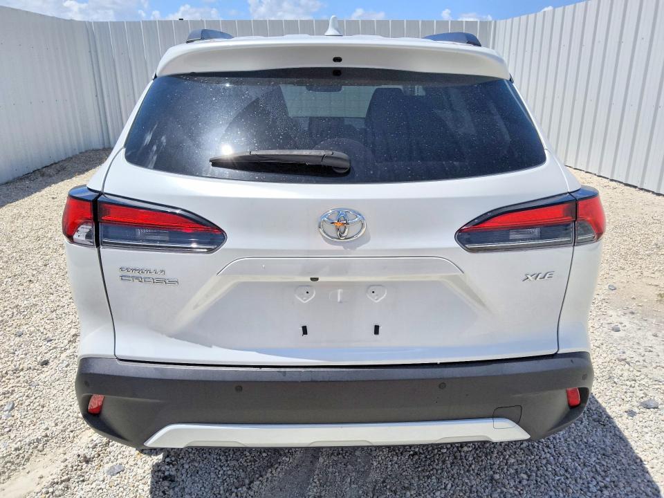 2023 Toyota Corolla cross VIN 7MUDAAAG4PV058951 COPART salvage auction — SIDE, NC - CERTIFICATE OF TITLE, sold $19,500 on 2026-07-14 (photo 6)