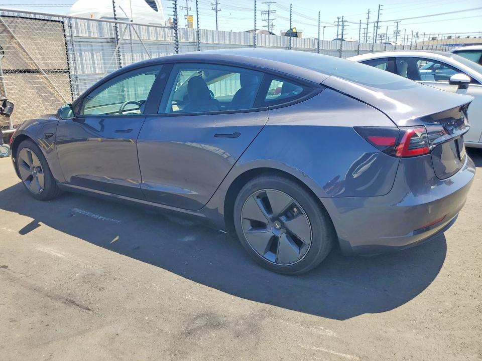 2023 Tesla Model 3 VIN 5YJ3E1EA3PF656579 COPART salvage auction — SIDE, Salvage Title, sold $8,300 on 2026-07-13 (photo 2)