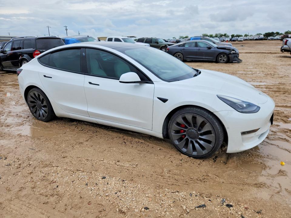 2021 Tesla Model 3 VIN 5YJ3E1ECXMF030816 COPART salvage auction — MINOR DENT/SCRATCHES, Wv - Certificate Of Title, sold $9,500 on 2026-07-09 (photo 4)