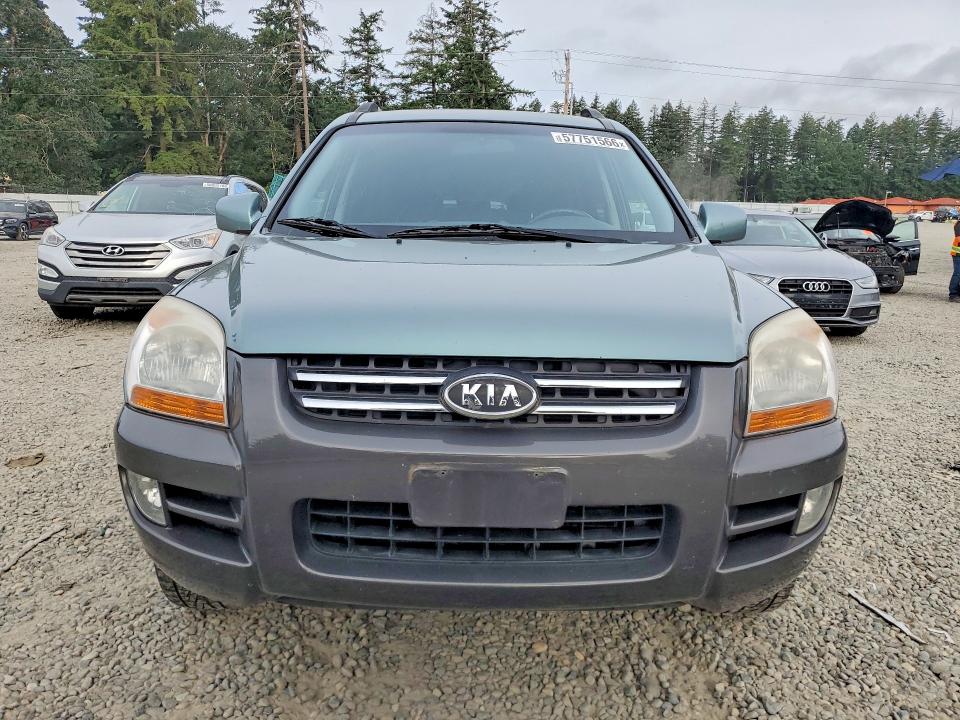 2006 Kia Sportage VIN KNDJE723767249482 COPART salvage auction — MECHANICAL, WA - VEHICLE CERT OF OWNERSHIP-TITL, sold $475 on 2026-07-24 (photo 5)