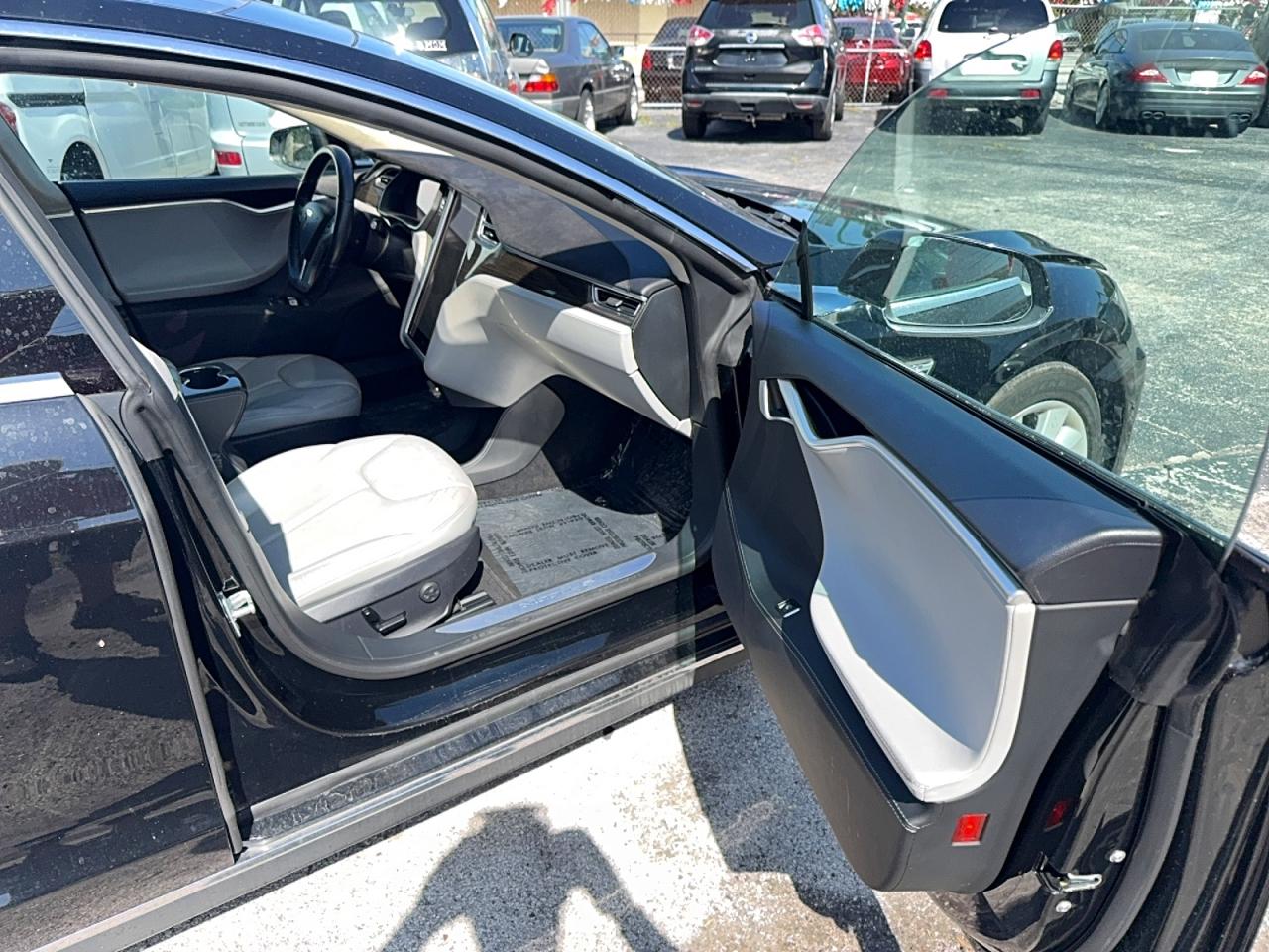 2014 Tesla Model S VIN 5YJSA1H1XEFP66125 COPART salvage auction — Normal Wear, FL - CERTIFICATE OF TITLE (P), sold $3,200 on 2026-07-01 (photo 5)