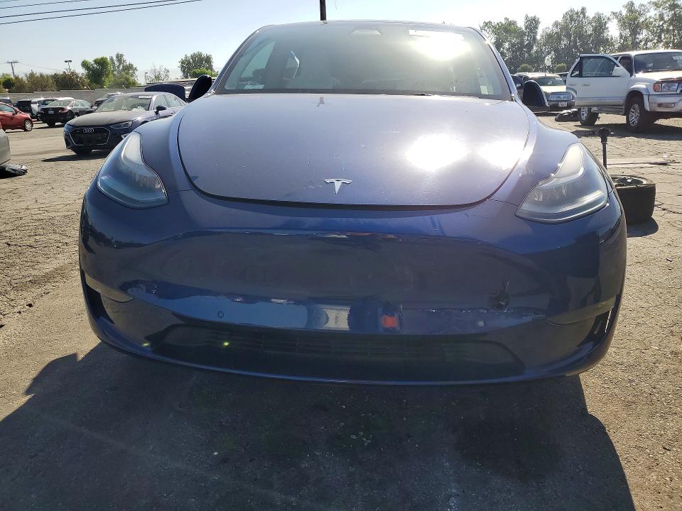 2022 Tesla Model y VIN 7SAYGDEF3NF489461 COPART salvage auction — SIDE, Ca - Salvage Certificate, sold $6,600 on 2026-07-02 (photo 5)