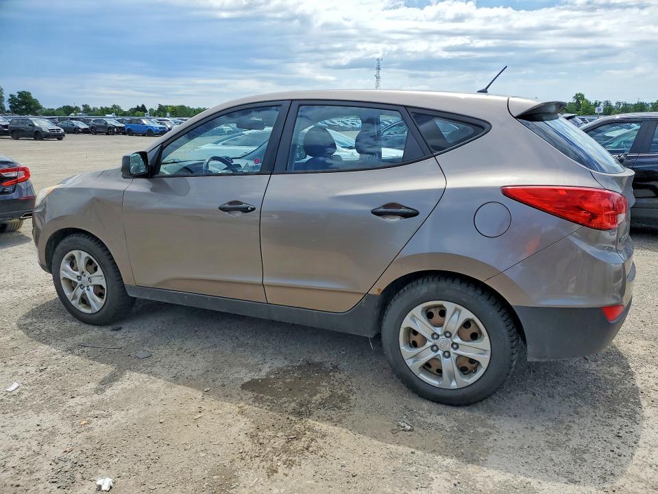 2010 Hyundai VIN KM8JT3AC6AU021026 COPART salvage auction — SIDE, On - Permit No Brand - Unfit, sold $875 on 2026-07-09 (photo 2)
