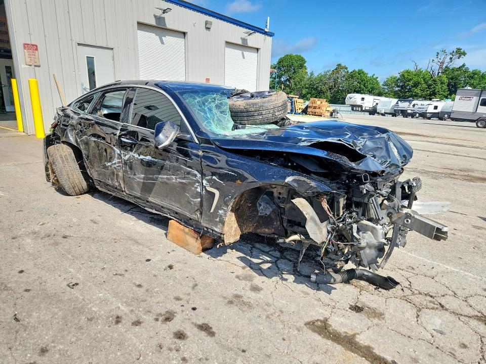 2016 BMW VIN WBA4B1C50GG242150 COPART salvage auction — ROLLOVER, Mo - Junking Certificate, sold $400 on 2026-07-15 (photo 4)