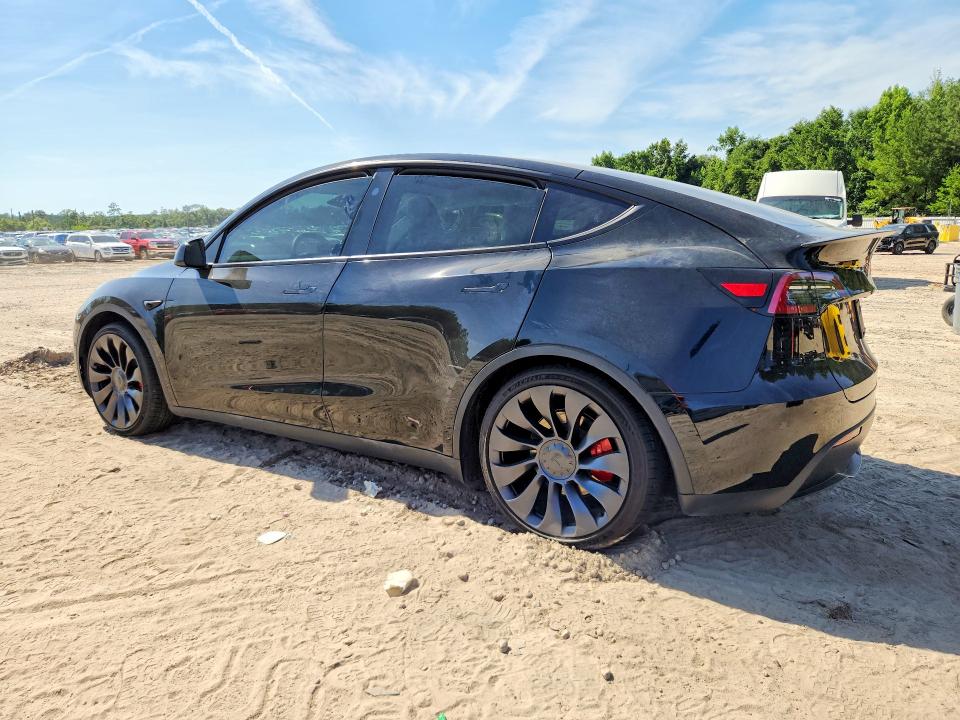 2024 Tesla Model y VIN 7SAYGDEF8RF039777 COPART salvage auction — SIDE, FL - CERT OF TITLE SLVG REBUILDABLE, sold $12,100 on 2026-07-24 (photo 2)