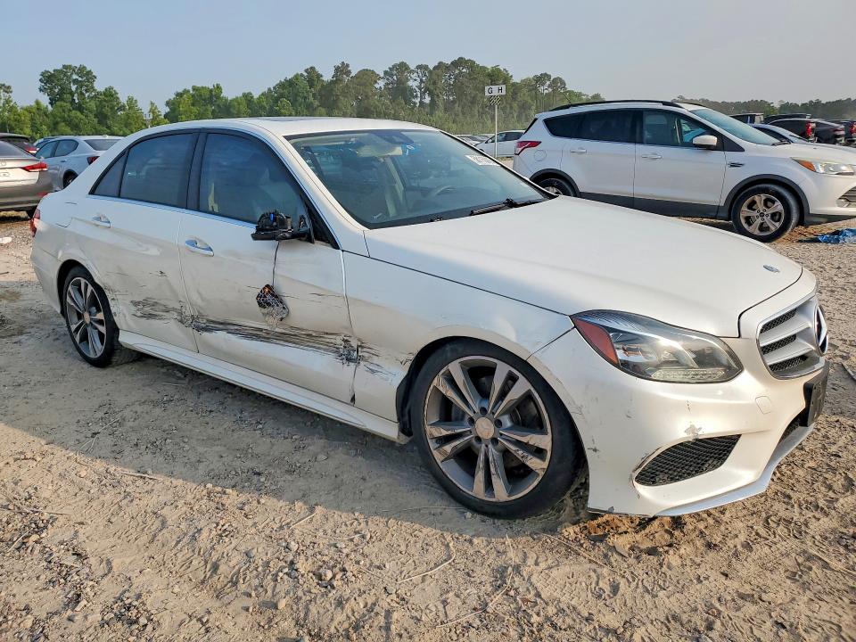 2014 Mercedes-benz E-klasse VIN WDDHF5KB0EA980804 COPART salvage auction — SIDE, TX - SALVAGE VEHICLE TITLE (P), sold $3,150 on 2026-07-17 (photo 4)