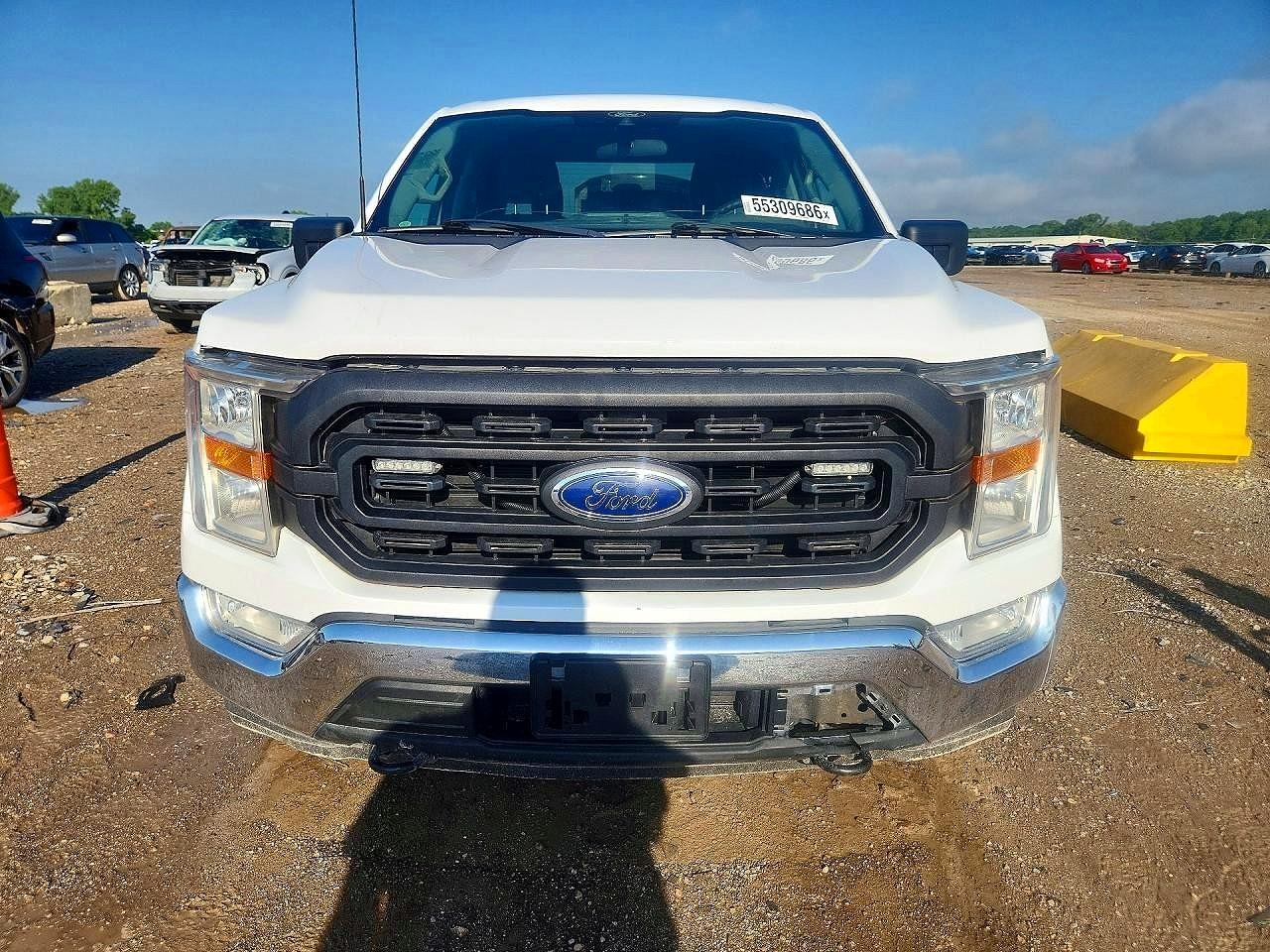 2021 Ford F-150 Lightning VIN 1FTFW1E88MFC73123 COPART salvage auction — Normal Wear, KS - CERTIFICATE OF TITLE, sold $8,000 on 2026-07-09 (photo 5)