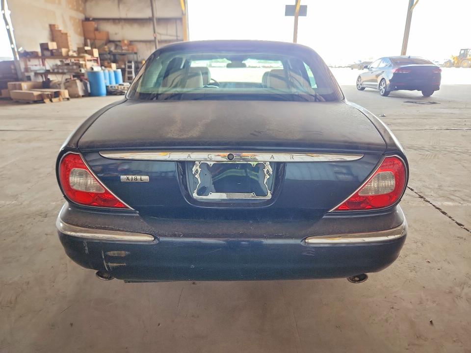 2006 Jaguar Xj series VIN SAJWA79B66SH07514 COPART salvage auction — MINOR DENT/SCRATCHES, Az - Certificate Of Title, sold $500 on 2026-07-06 (photo 6)