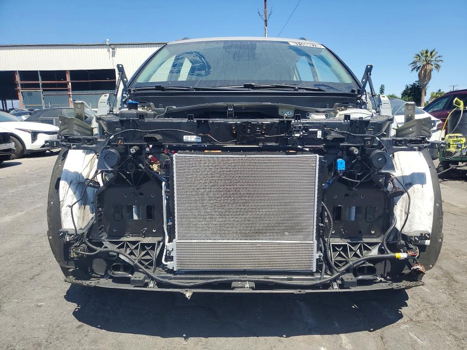 2026 Hyundai Ioniq VIN 7YAMUFS32TY004596 COPART salvage auction — STRIPPED, CA - CERTIFICATE OF TITLE, sold $12,900 on 2026-07-14 (photo 5)