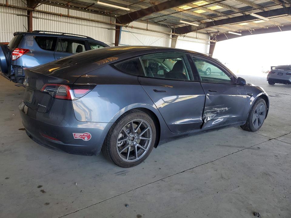 2023 Tesla Model 3 VIN 5YJ3E1EB1PF634234 COPART salvage auction — SIDE, Ca - Salvage Certificate, sold $5,500 on 2026-07-02 (photo 3)