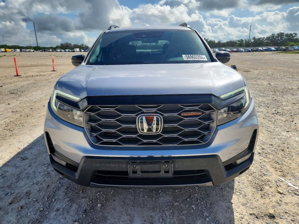 2023 Honda Passport VIN 5FNYF8H65PB028820 COPART salvage auction — SIDE, Tx - Salvage Vehicle Title, sold $14,000 on 2026-07-09 (photo 5)