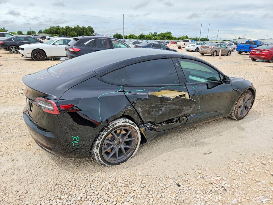 2021 Tesla VIN 5YJ3E1EA6MF921619 COPART salvage auction — SIDE, TX - SALVAGE VEHICLE TITLE (P), sold $5,700 on 2026-07-23 (photo 3)