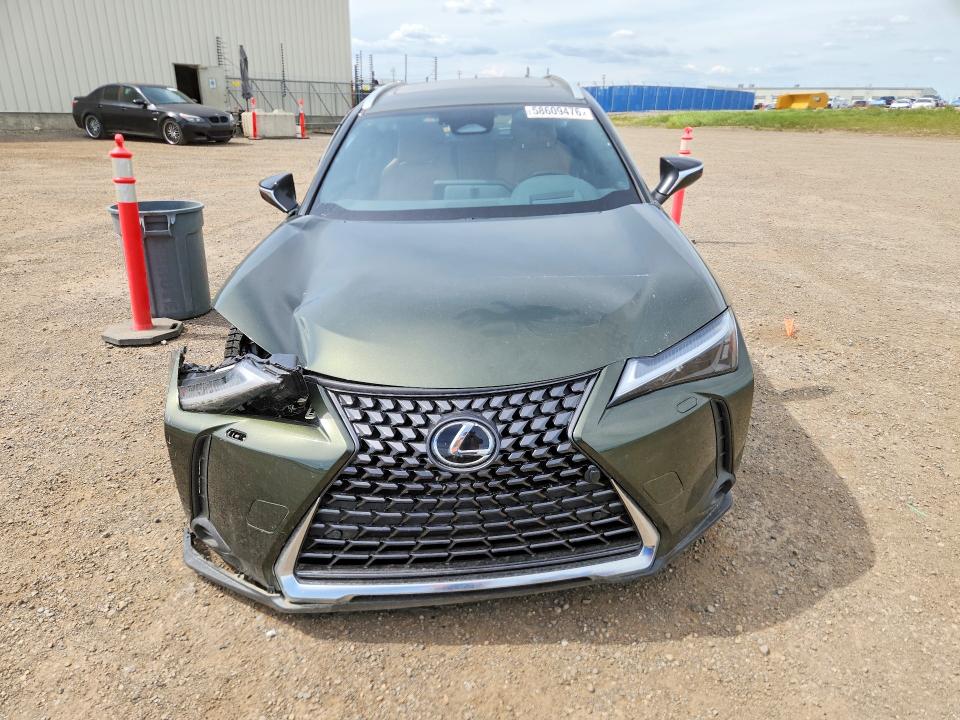 2025 Lexus Ux VIN JTHUCJDH5S2012956 COPART salvage auction — SIDE, Ab - Bos - Salvage, sold $13,500 on 2026-07-14 (photo 5)