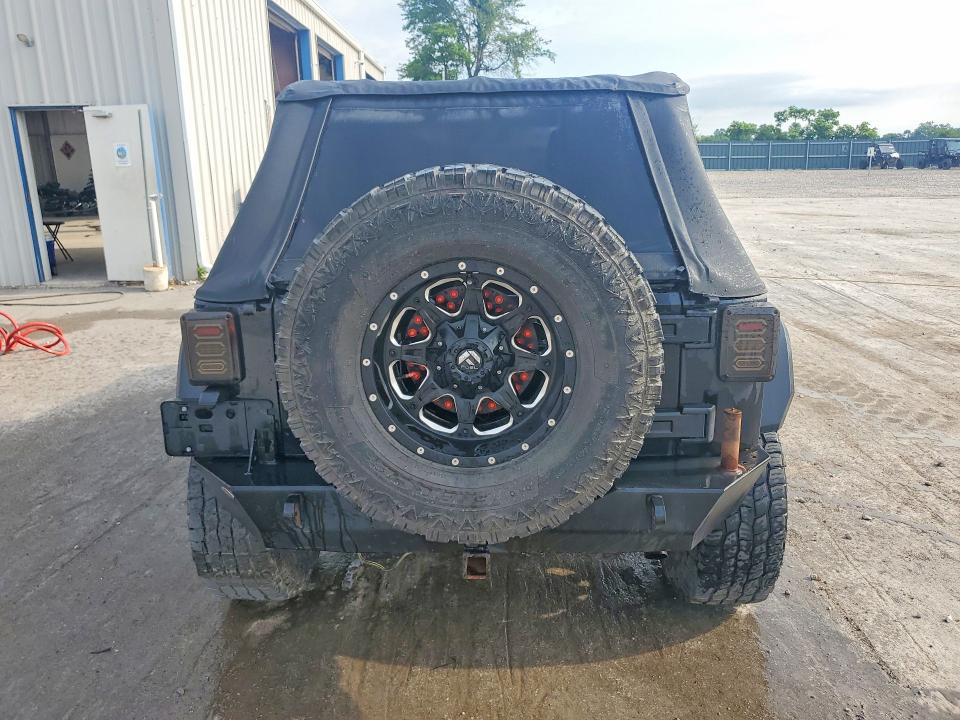 2014 Jeep Wrangler unlimited VIN 1C4BJWDG8EL120036 COPART salvage auction — ALL OVER, Mo - Salvage Certificate Of Title, sold $50 on 2026-08-10 (photo 6)