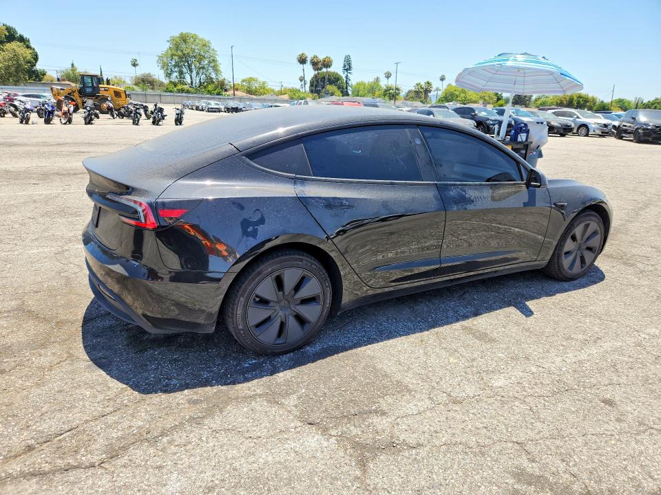 2025 Tesla VIN 5YJ3E1EA1SF011065 COPART salvage auction — SIDE, CA - SALVAGE CERTIFICATE, sold $10,700 on 2026-07-28 (photo 3)
