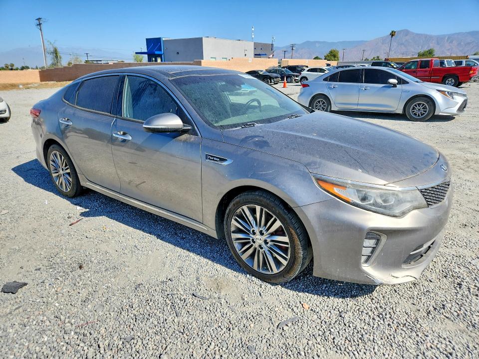 2018 Kia Optima VIN 5XXGV4L2XJG194878 COPART salvage auction — ENGINE BURN, Ca - Salvage Certificate, sold $500 on 2026-07-29 (photo 4)