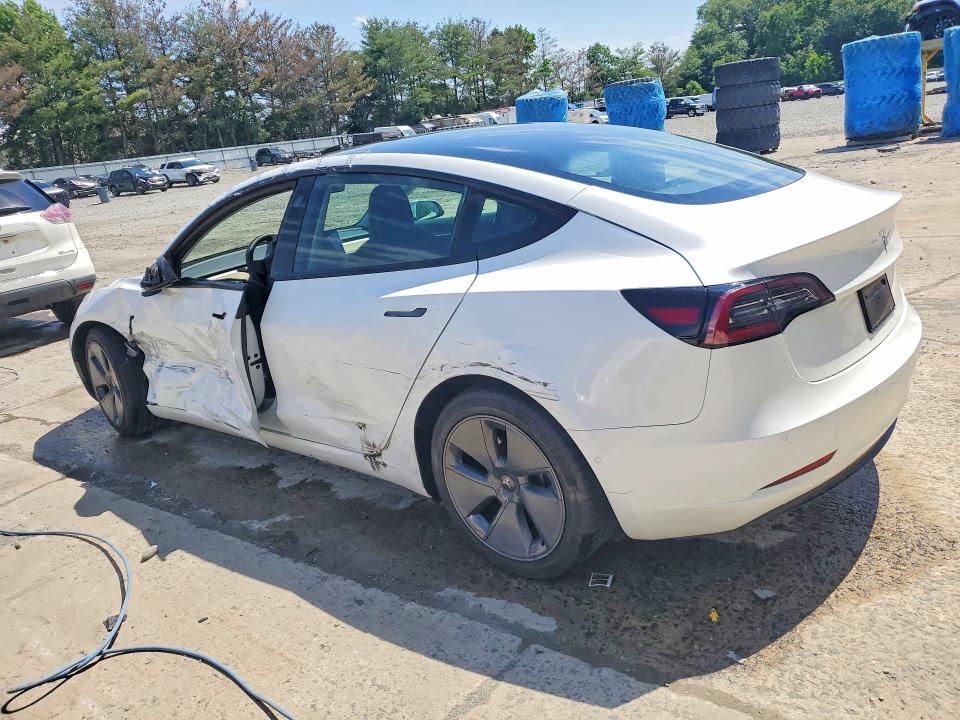 2021 Tesla VIN 5YJ3E1EA2MF031019 COPART salvage auction — SIDE, NJ - CERT OF TITLE-SALVAGE, sold $7,600 on 2026-07-27 (photo 2)