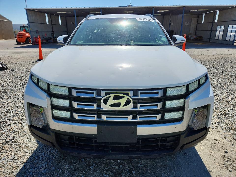 2025 Hyundai Santa cruz VIN 5NTJBDDE6SH135647 COPART salvage auction — HAIL, Co - Certificate Of Title, sold $13,700 on 2026-07-23 (photo 5)