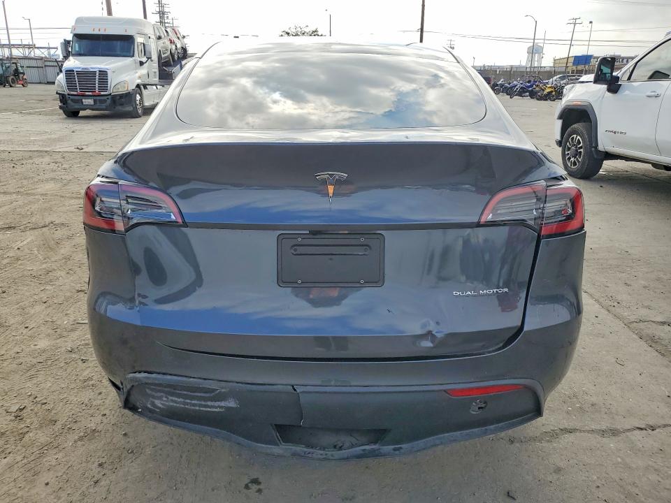 2023 Tesla Model y VIN 7SAYGDEE0PF840045 COPART salvage auction — REAR END, Az - Dis/Dlr/Exp Only Salvage Title, sold $15,200 on 2026-07-29 (photo 6)